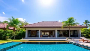 Phuket real estate agency showcasing luxury villas with stunning pool views and lush landscapes.